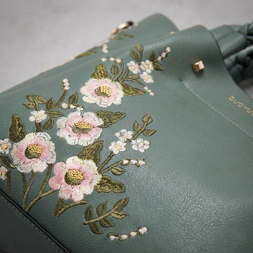 Veloura™ – "Floral Aura" Satchel with Artisanal Braided Handle